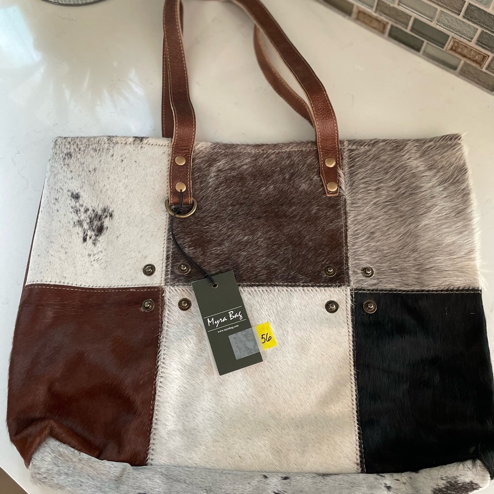 S1163 multi patch cowhide tote